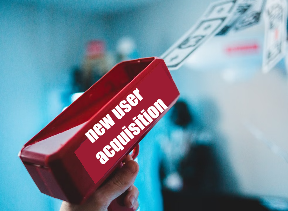 A red toy money gun labelled "new user acquisition", firing banknotes into the air